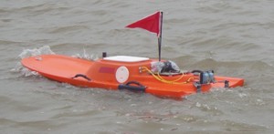 Photograph of OceanScience planning hull boat